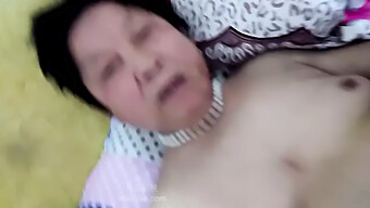 Old Chinese Woman Engages In Sexual Intercourse