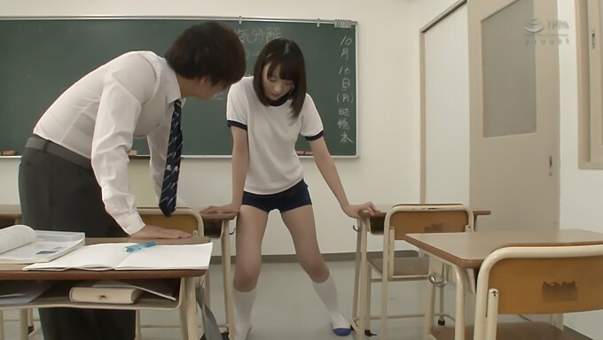 A Japanese teen girl in gym shorts interrupts my study session in the classroom