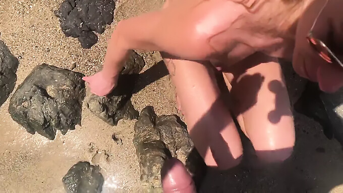 Wet and wild fun on the beach with piss play