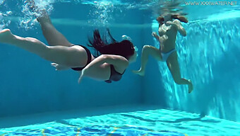 Two American Girls Swim Naked In The Pool