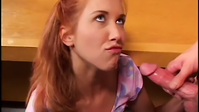 Redheaded coed gives a blowjob and has sex on a desk with her professor